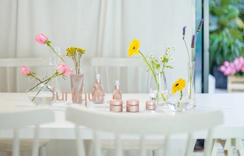 Pink, Yellow, Table, Centrepiece, Flower, Textile, Plant, Room, Furniture, Vase, 
