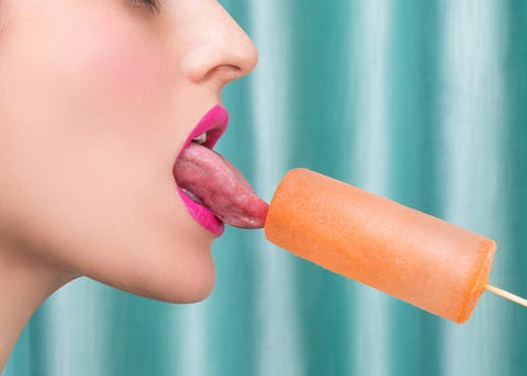 Ice pop, Frozen dessert, Lip, Nose, Skin, Pink, Neck, Food, Mouth, Finger, 