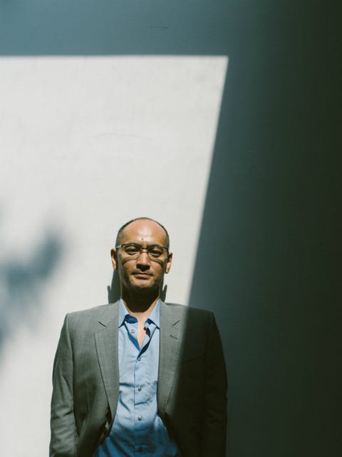 Face, Blue, Head, Yellow, Glasses, Suit, Forehead, Eyewear, White-collar worker, Facial hair, 
