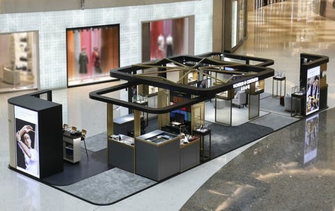 Display case, Furniture, Table, Interior design, Room, Architecture, Design, Building, Material property, Floor, 