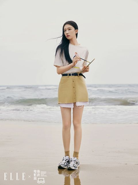 White t-shirt: new balance neutral short-sleeved t-shirt yellow skirt: stylist’s own shoes: new balance 1906r series neutral retro casual shoes