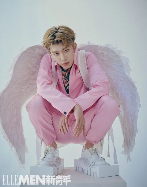 Pink, Angel, Sitting, Fun, Fictional character, Outerwear, Photography, Illustration, Supernatural creature, Wing, 
