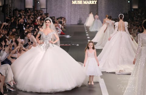 Gown, Wedding dress, Dress, Fashion model, Clothing, Bridal clothing, Fashion, Haute couture, Bride, Shoulder, 