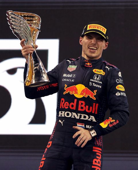 abu dhabi, united arab emirates   december 12 race winner and 2021 f1 world drivers champion max verstappen of netherlands and red bull racing celebrates on the podium during the f1 grand prix of abu dhabi at yas marina circuit on december 12, 2021 in abu dhabi, united arab emirates photo by kamran jebreili   poolgetty images