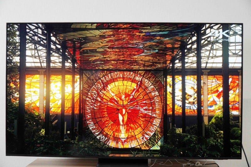 vibrant stained glass design with intricate patterns and colors depicting figures