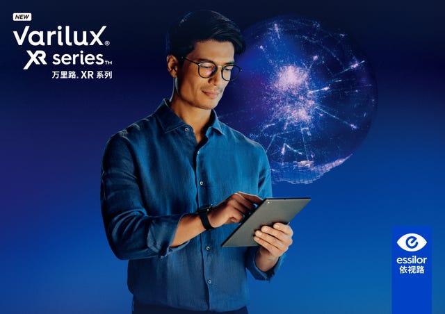 a man holding a tablet a man holding a tablet