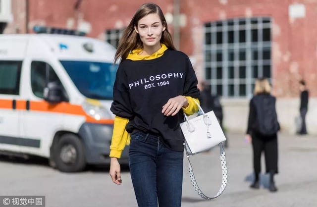 Street fashion, Yellow, Fashion, Transport, Snapshot, Footwear, Outerwear, Street, Vehicle, Pedestrian, 