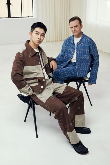 a person sitting on a chair next to a person sitting on a chair