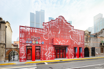 vibrantly painted building with artistic designs and signage