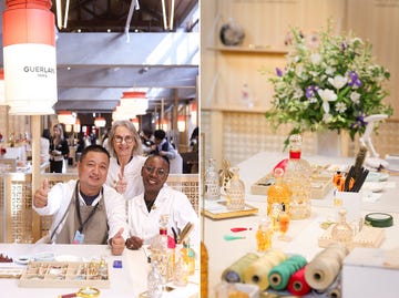 group of individuals at a crafting event with decorative and aromatic items on a table