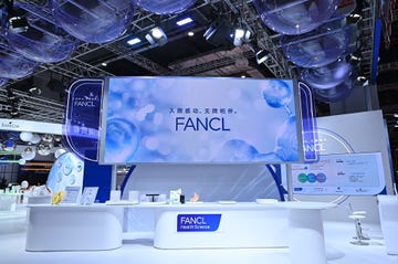 trade show booth displaying fancl branding and health science products