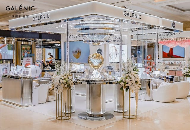 cosmetic brand display featuring products and modern design