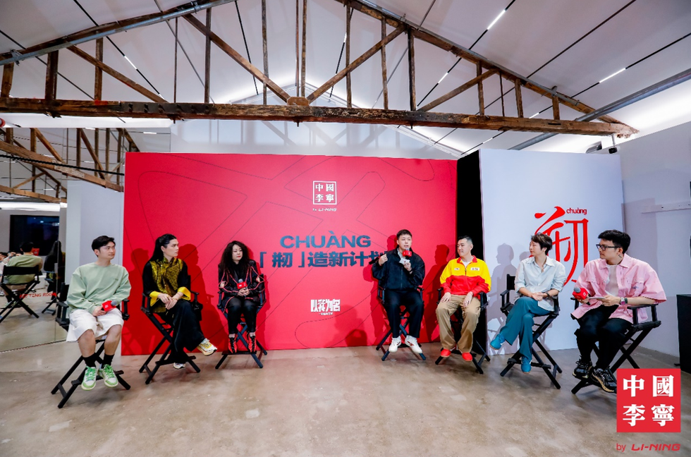 a group of people sitting in chairs