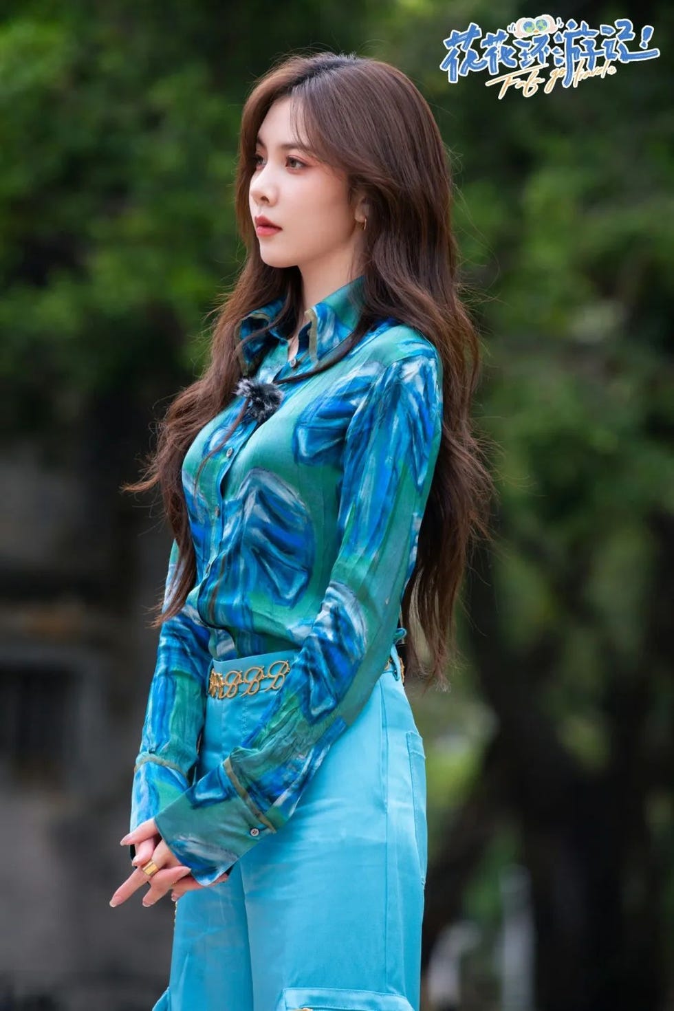 a woman in a blue dress