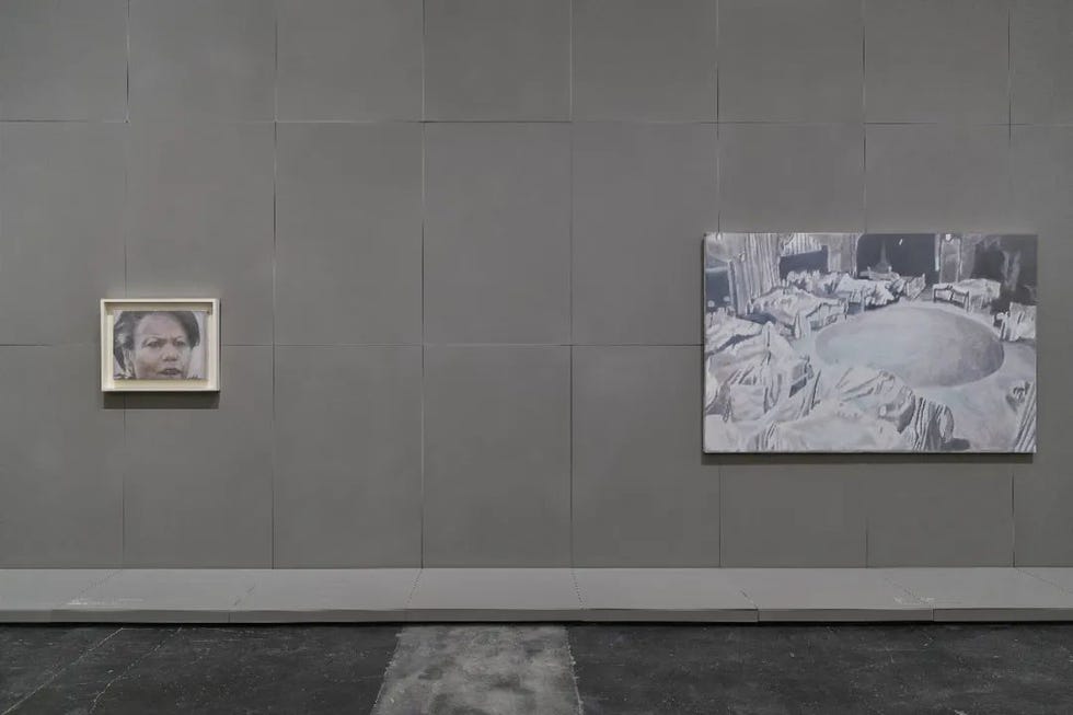 artwork displayed on a gray wall