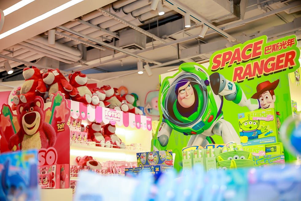 display of toy story merchandise in a colorful retail environment
