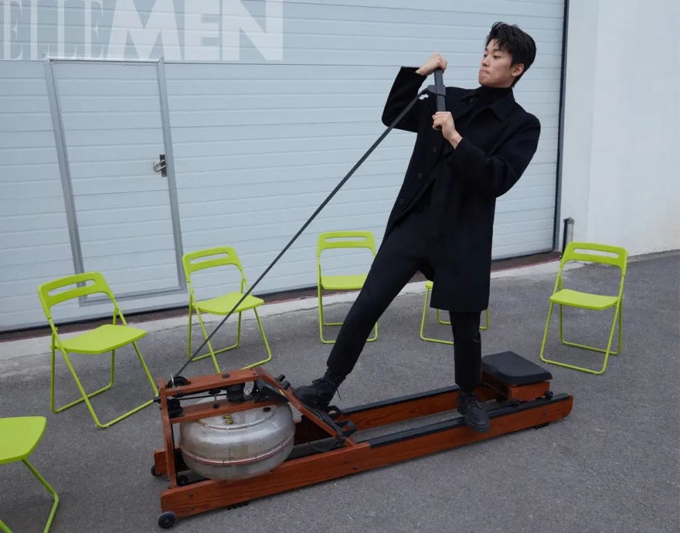 a person using a rowing machine outdoors