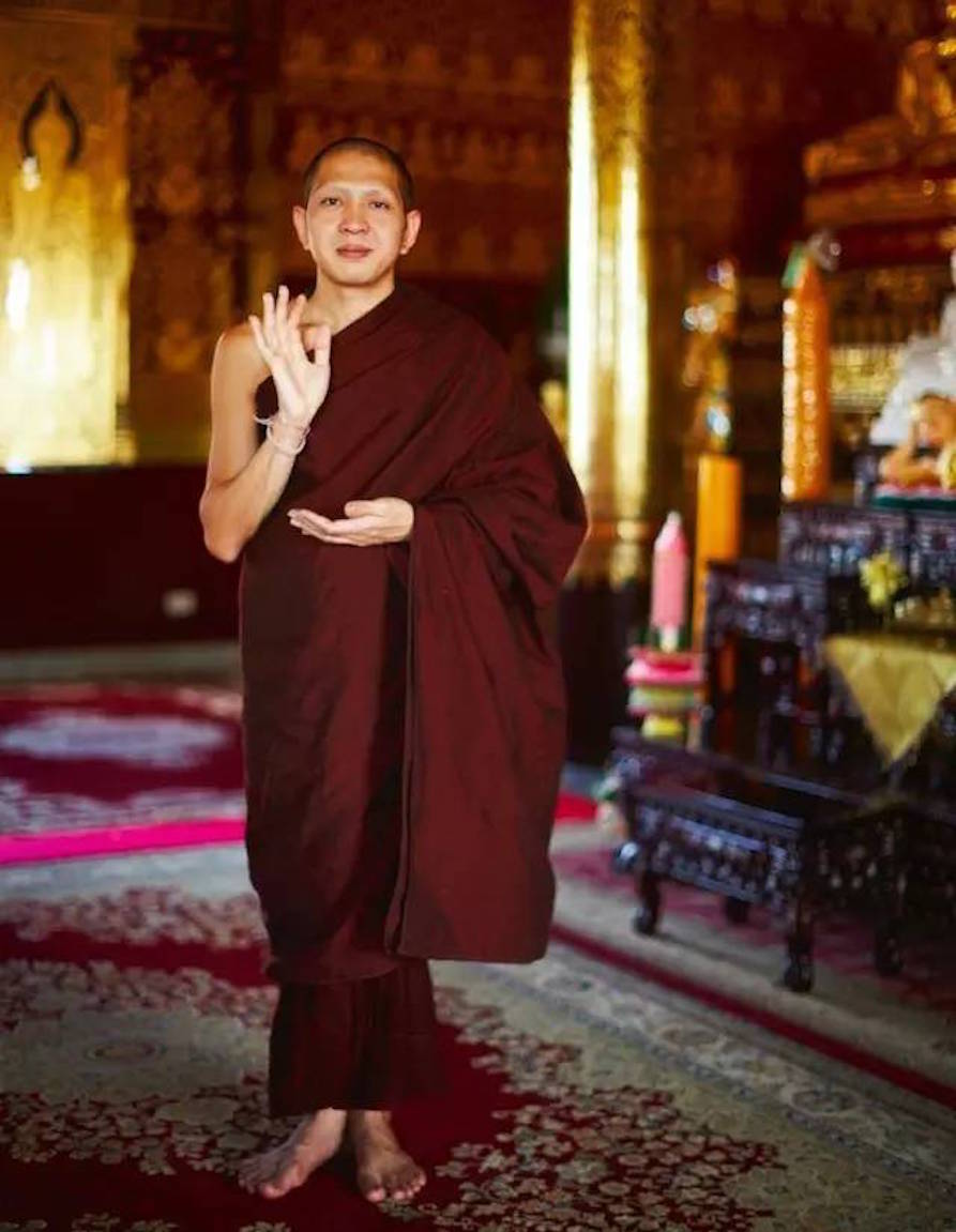 Flooring, Temple, Maroon, Monk, Carpet, Guru, Lama, Holy places, Zen master, Place of worship, 