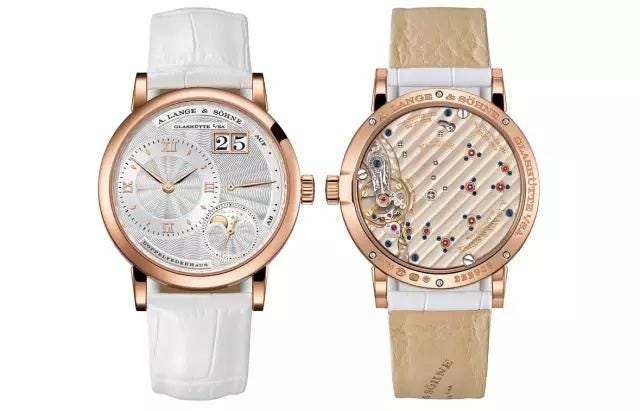 Watch, Analog watch, Watch accessory, Fashion accessory, Strap, Jewellery, Beige, Brand, Material property, Font, 