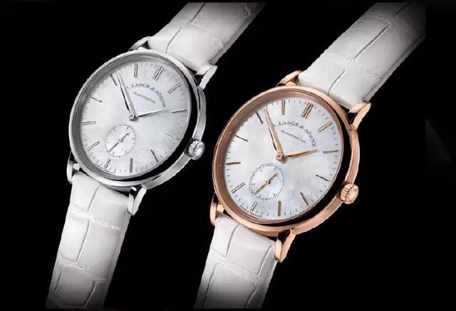 Watch, Analog watch, White, Watch accessory, Fashion accessory, Strap, Jewellery, Brand, Material property, Silver, 