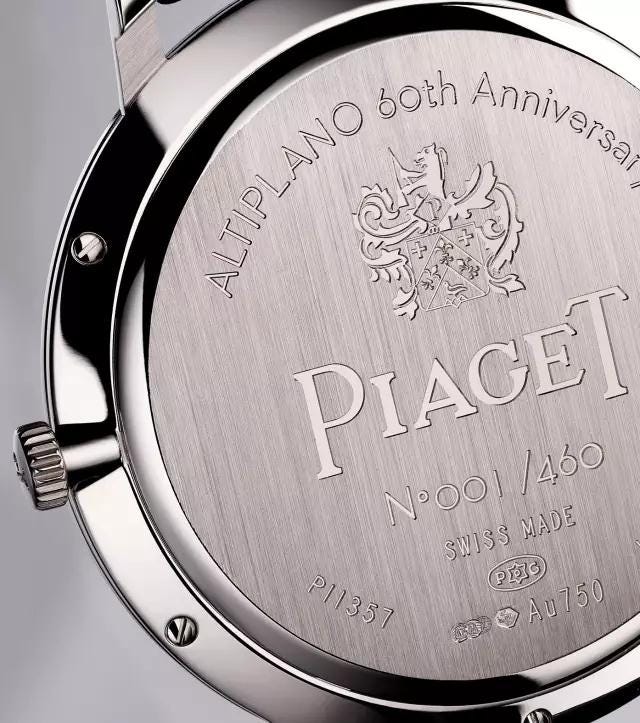 Watch, Analog watch, Watch accessory, Silver, Fashion accessory, Brand, Platinum, Metal, Titanium, Jewellery, 