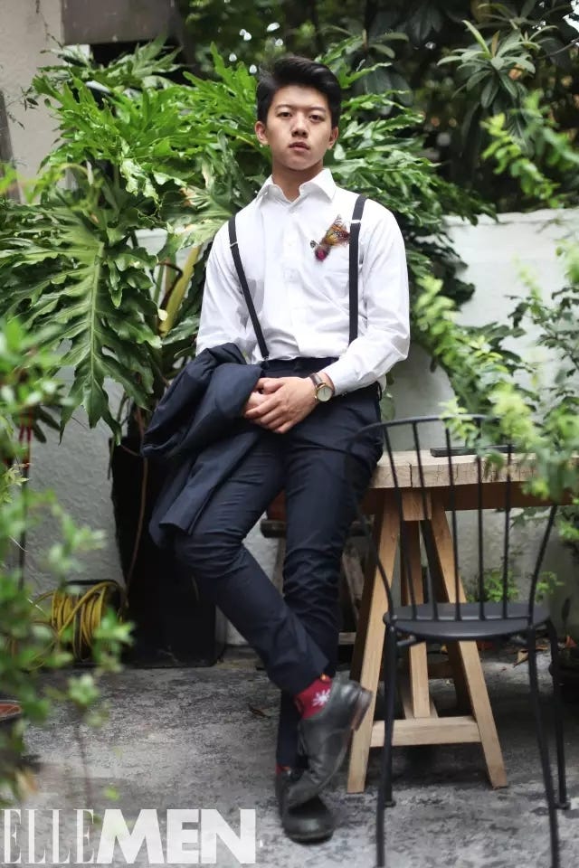 Sitting, Footwear, Suit, Formal wear, Outerwear, Uniform, Photography, Shoe, Plant, Leisure, 