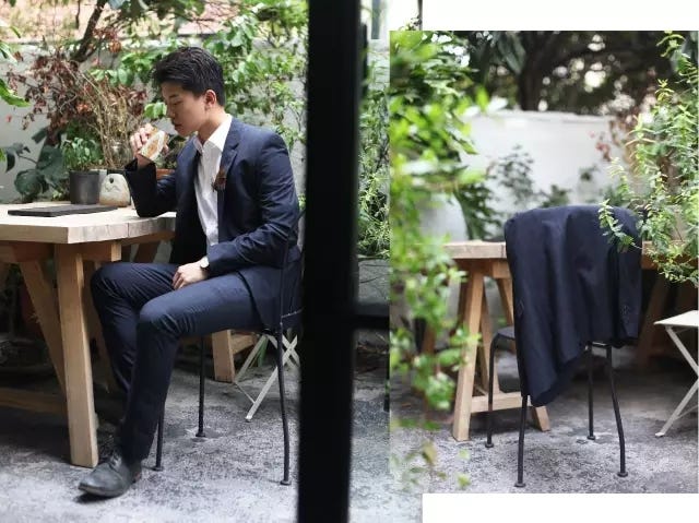 Suit, Formal wear, Houseplant, Furniture, Sitting, Table, Chair, Outerwear, Tuxedo, White-collar worker, 