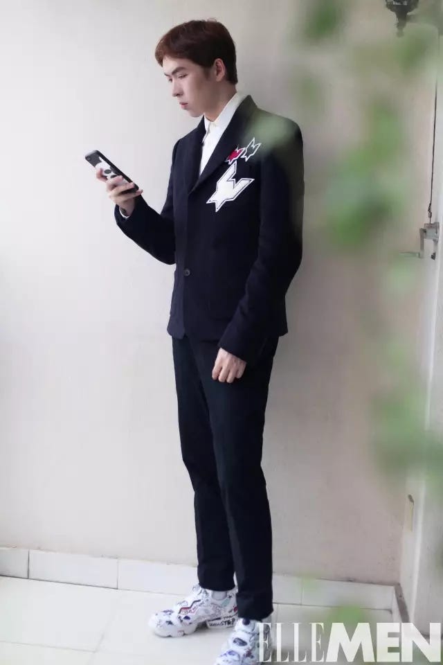 Clothing, Suit, Formal wear, Standing, Uniform, Blazer, Outerwear, Tuxedo, Collar, Jacket, 