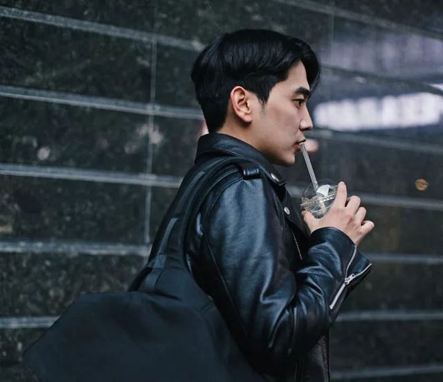 Smoking, Leather jacket, Snapshot, Jacket, Leather, Textile, Black hair, Photography, Singer, Tobacco products, 