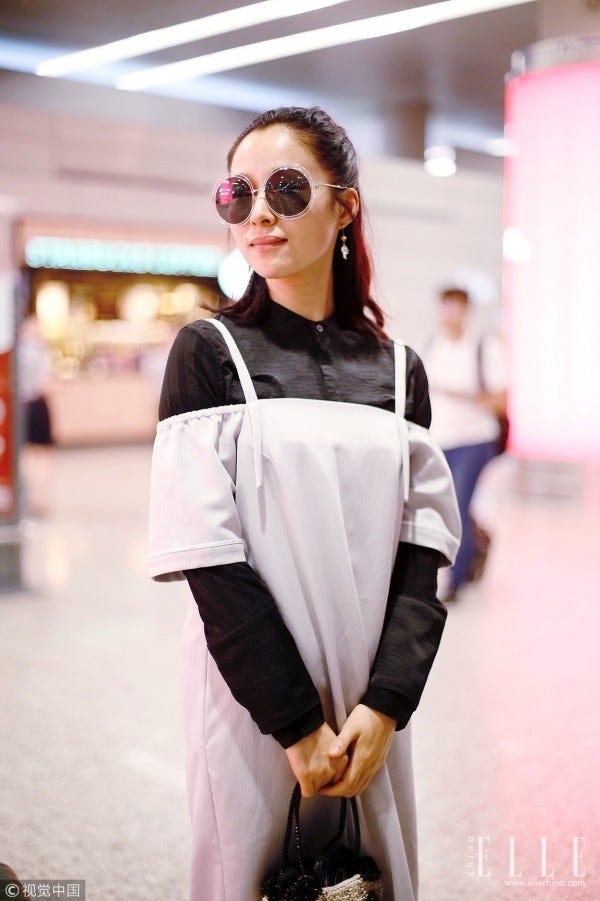 Shoulder, Clothing, White, Street fashion, Eyewear, Pink, Fashion, Outerwear, Joint, Sleeve, 