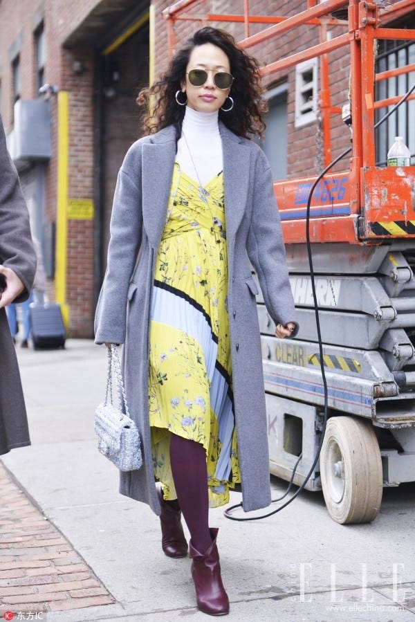 Clothing, Street fashion, Photograph, Yellow, Fashion, Snapshot, Outerwear, Footwear, Sweater, Eyewear, 