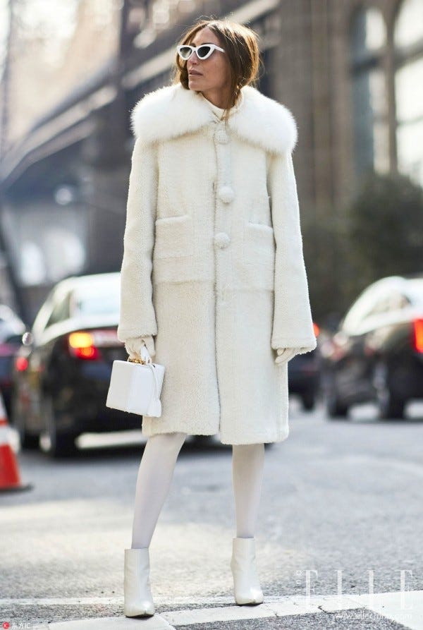 Clothing, Fur, Street fashion, White, Photograph, Coat, Fashion, Overcoat, Snapshot, Fur clothing, 