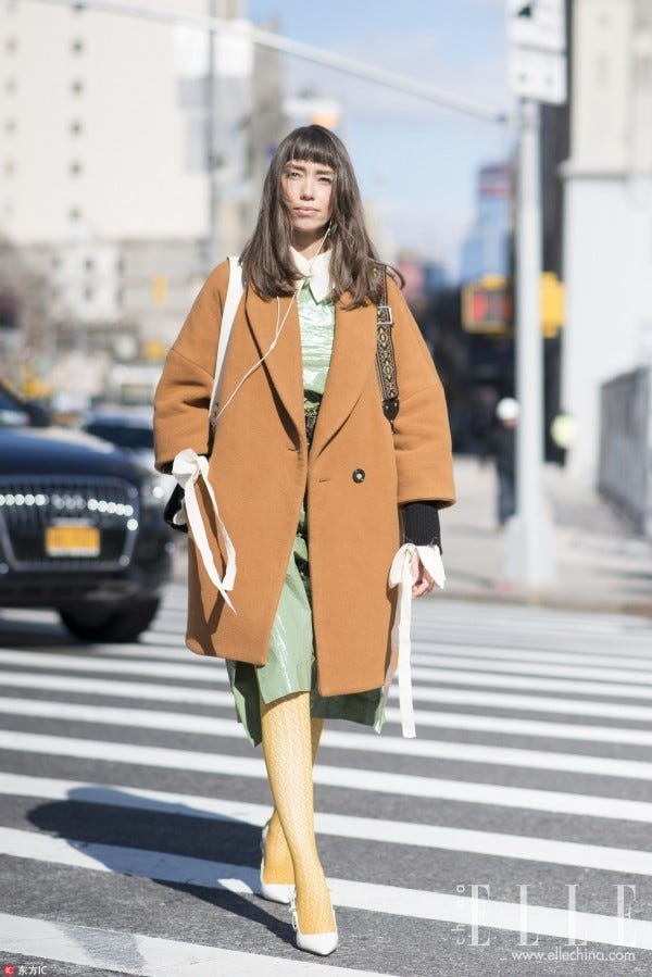 Clothing, Street fashion, Photograph, Coat, Fashion, Yellow, Snapshot, Outerwear, Trench coat, Footwear, 