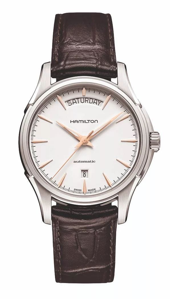 Watch, Analog watch, Strap, Watch accessory, Fashion accessory, Brown, Jewellery, Material property, Brand, Silver, 