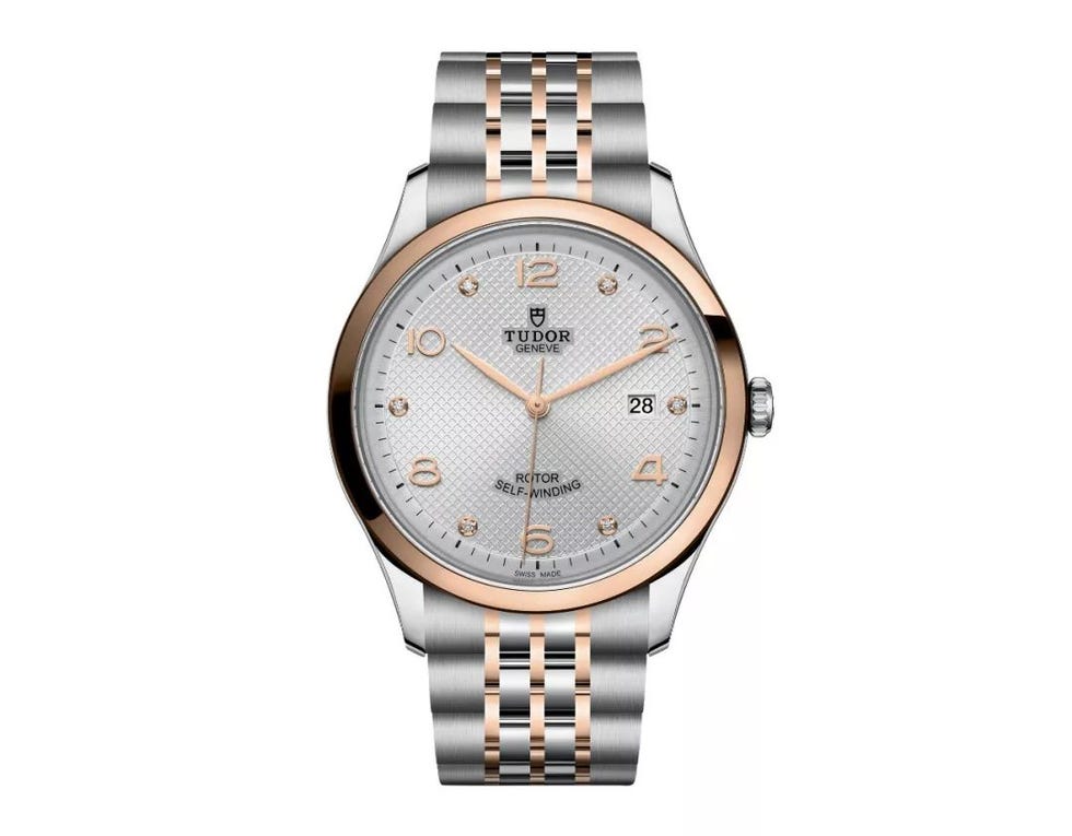 Watch, Analog watch, Watch accessory, Fashion accessory, Jewellery, Strap, Brand, Material property, Silver, Font, 