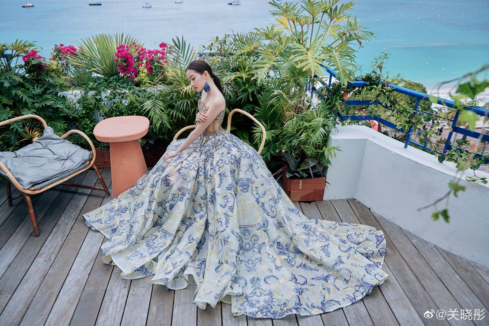 Dress, Gown, Wedding dress, Fashion, Leisure, Bridal clothing, Vacation, Flower, Plant, Textile, 