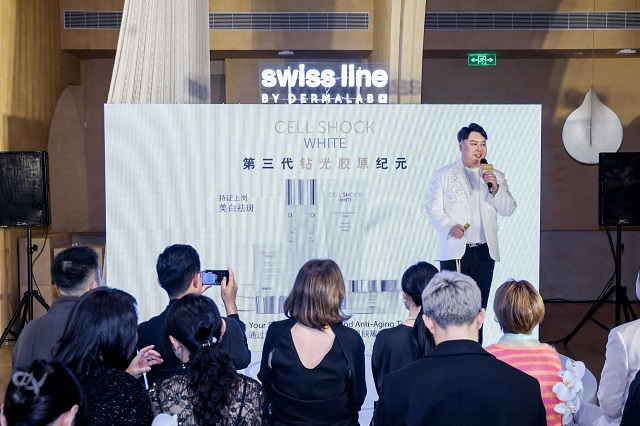 a presentation event featuring skincare products with an audience