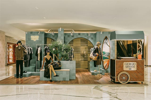 giorgio armani retail display showcasing clothing and accessories