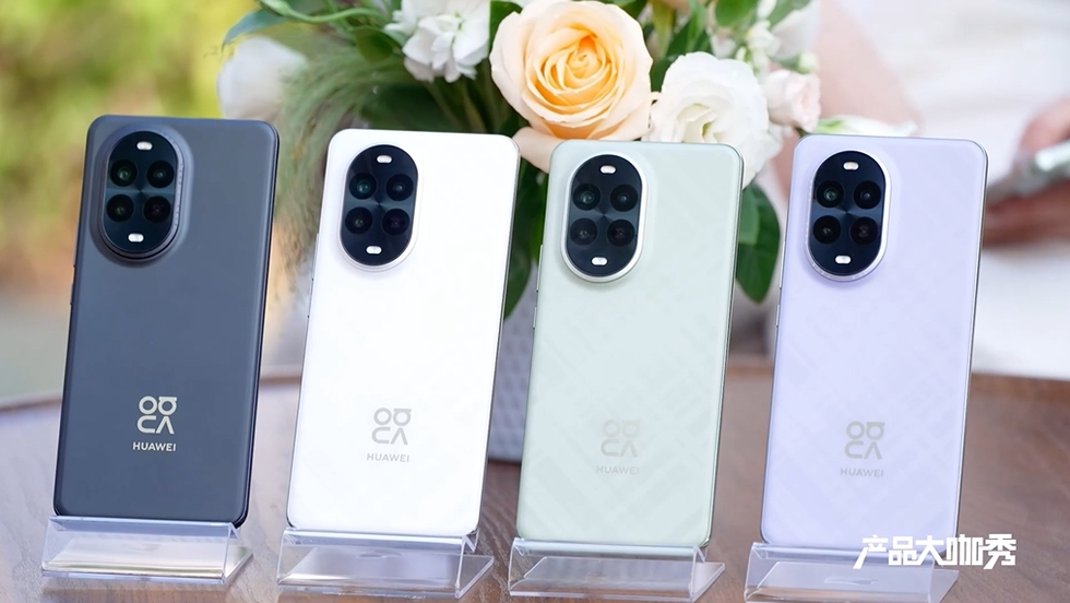 display of four huawei smartphones in varying colors