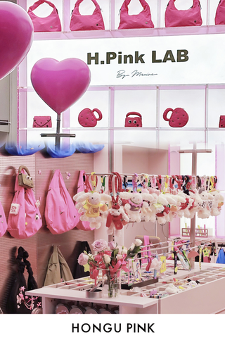a vibrant retail store featuring pinkthemed accessories and toys