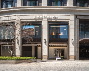 fashion retail storefront with brand signage
