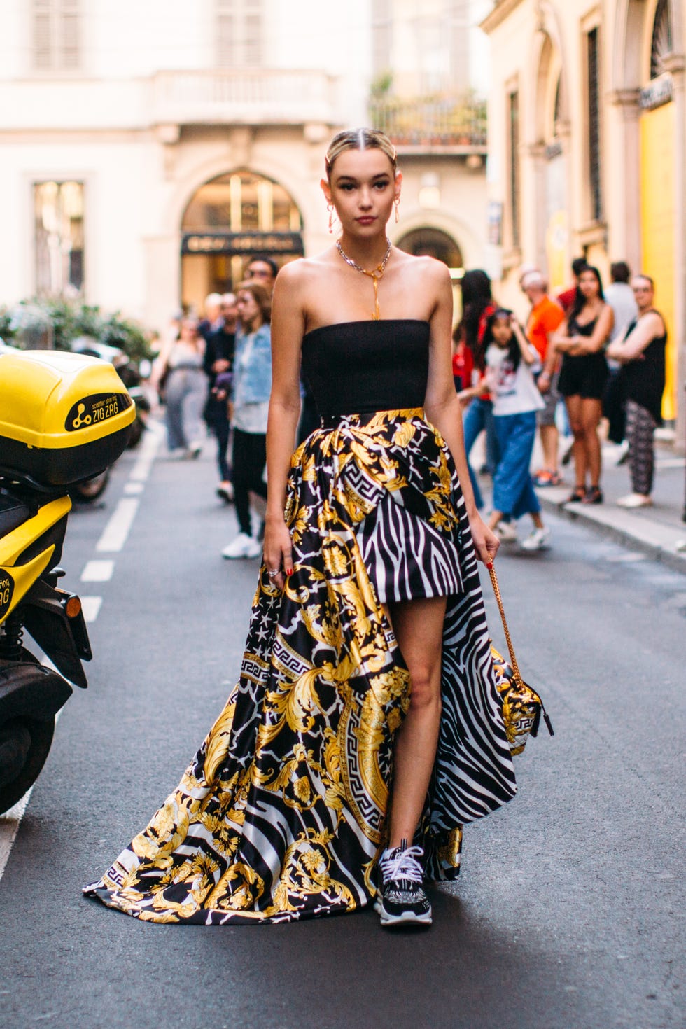 Fashion model, Clothing, Fashion, Street fashion, Yellow, Shoulder, Dress, Haute couture, Strapless dress, Footwear, 