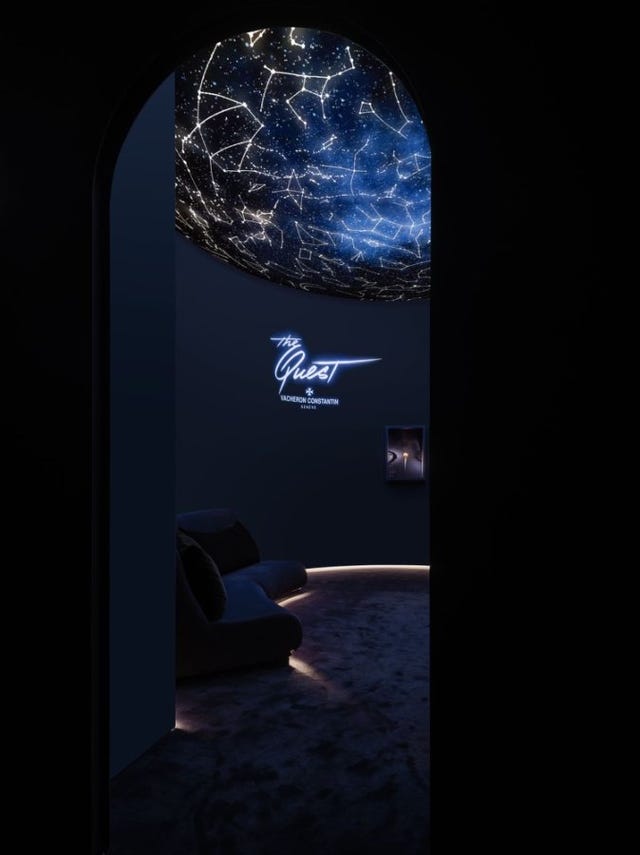room featuring a starry ceiling and a sofa