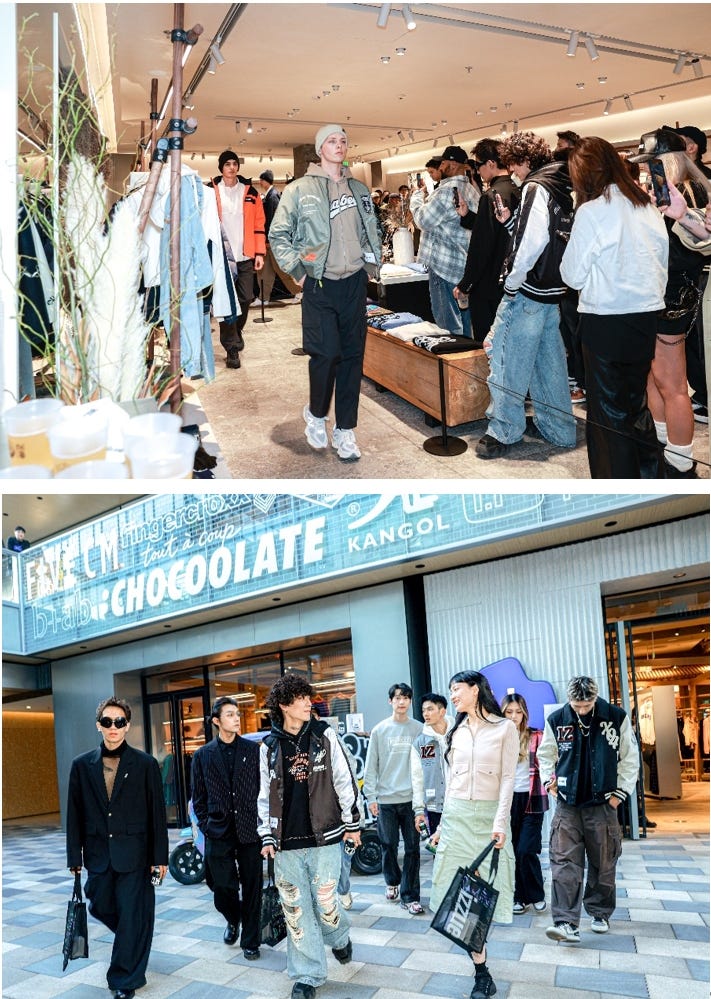 a group of people standing in front of a store