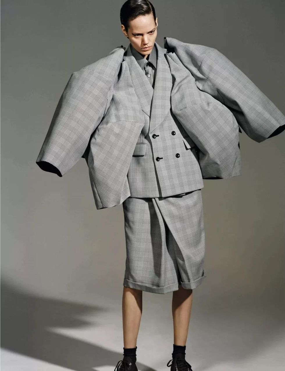 Clothing, Fashion, Fashion model, Outerwear, Overcoat, Coat, Suit, Human, Fashion design, Model, 