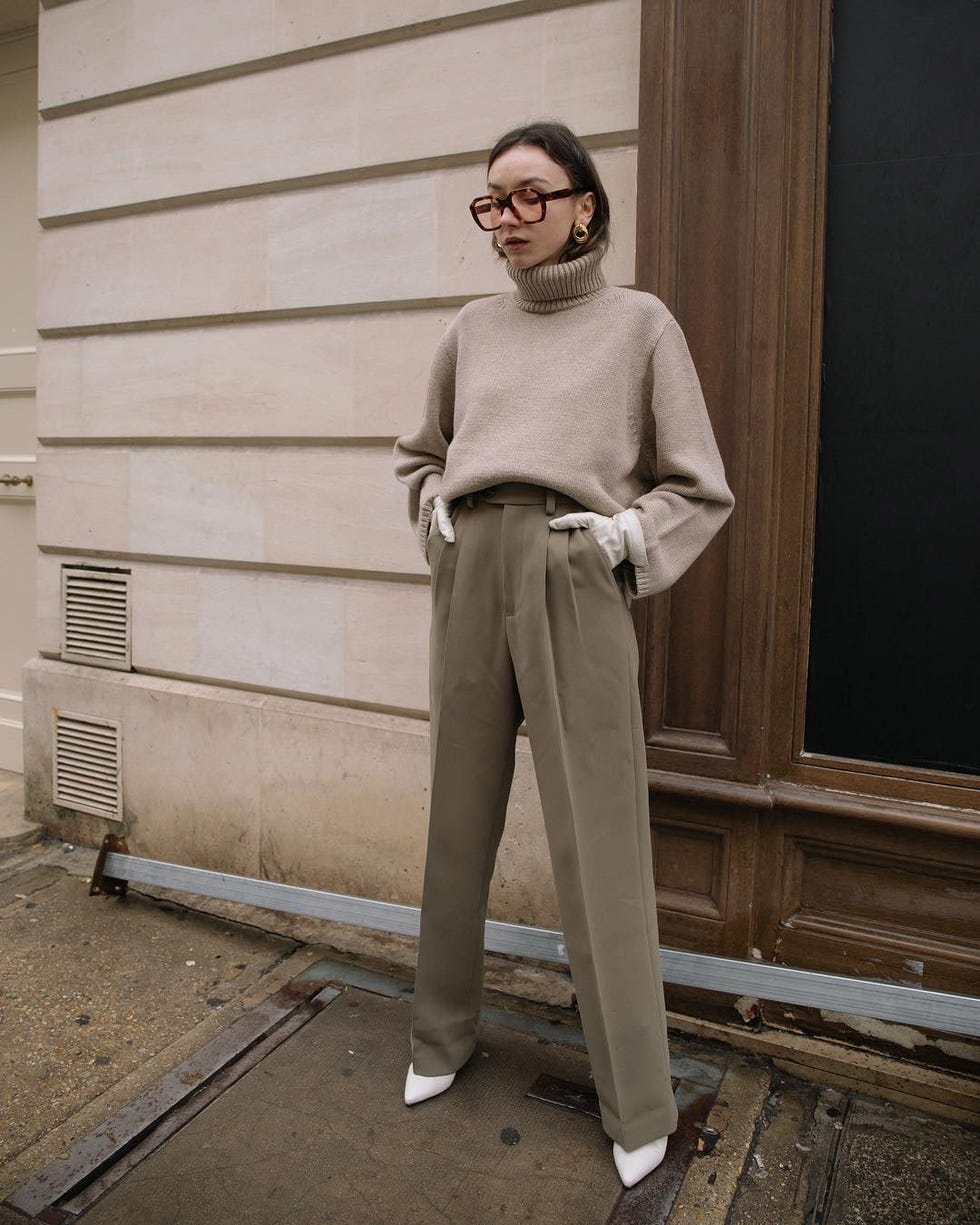 Photograph, Standing, Leg, Fashion, Sitting, Trousers, Beige, Neck, Street fashion, Shoe, 