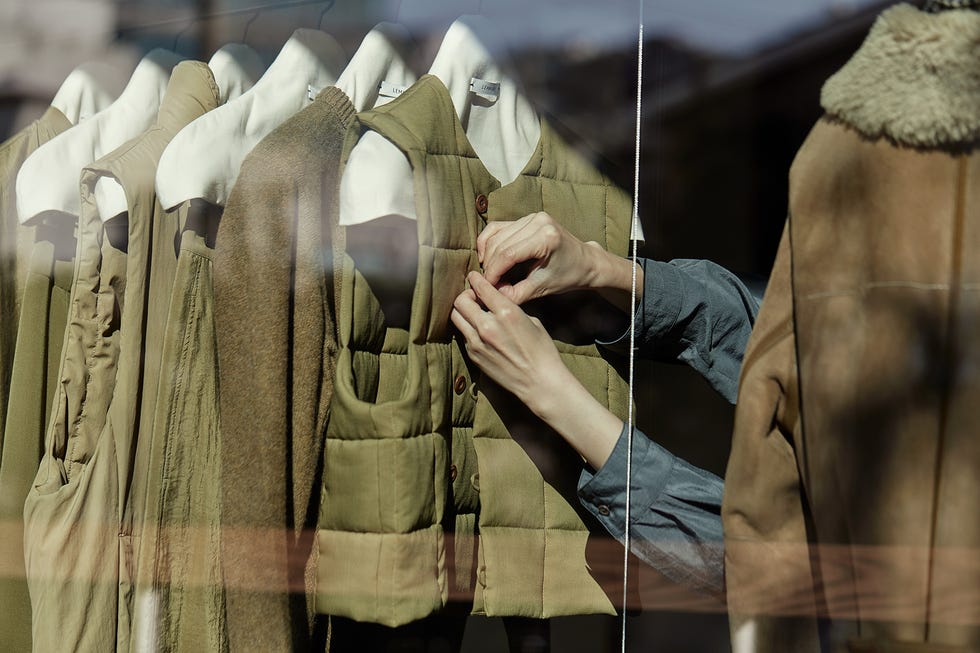 a person holding a cloth