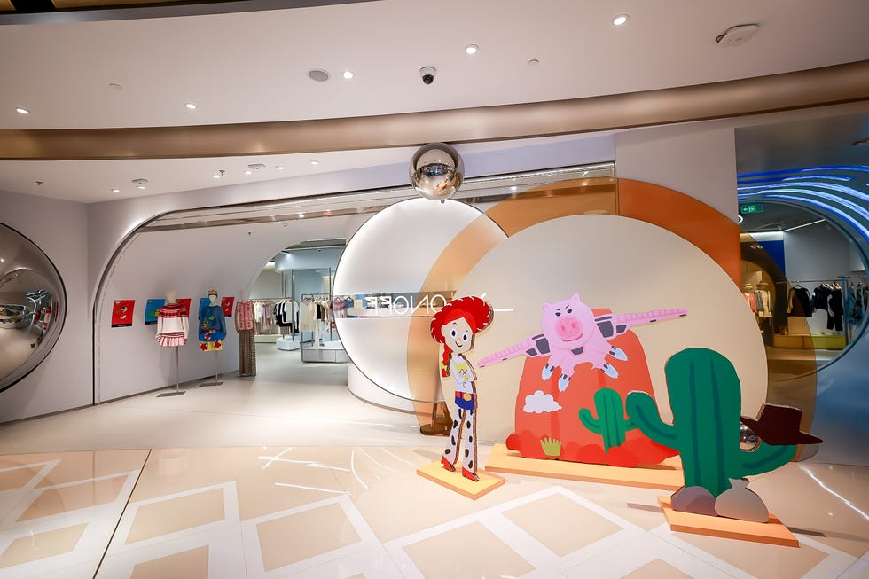 childrens clothing store display with animated characters