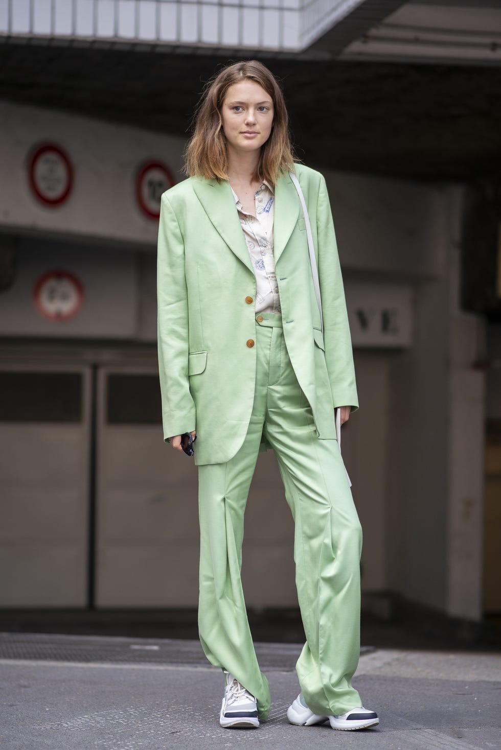 a person in a green suit