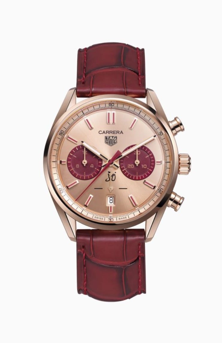 a red and white wrist watch